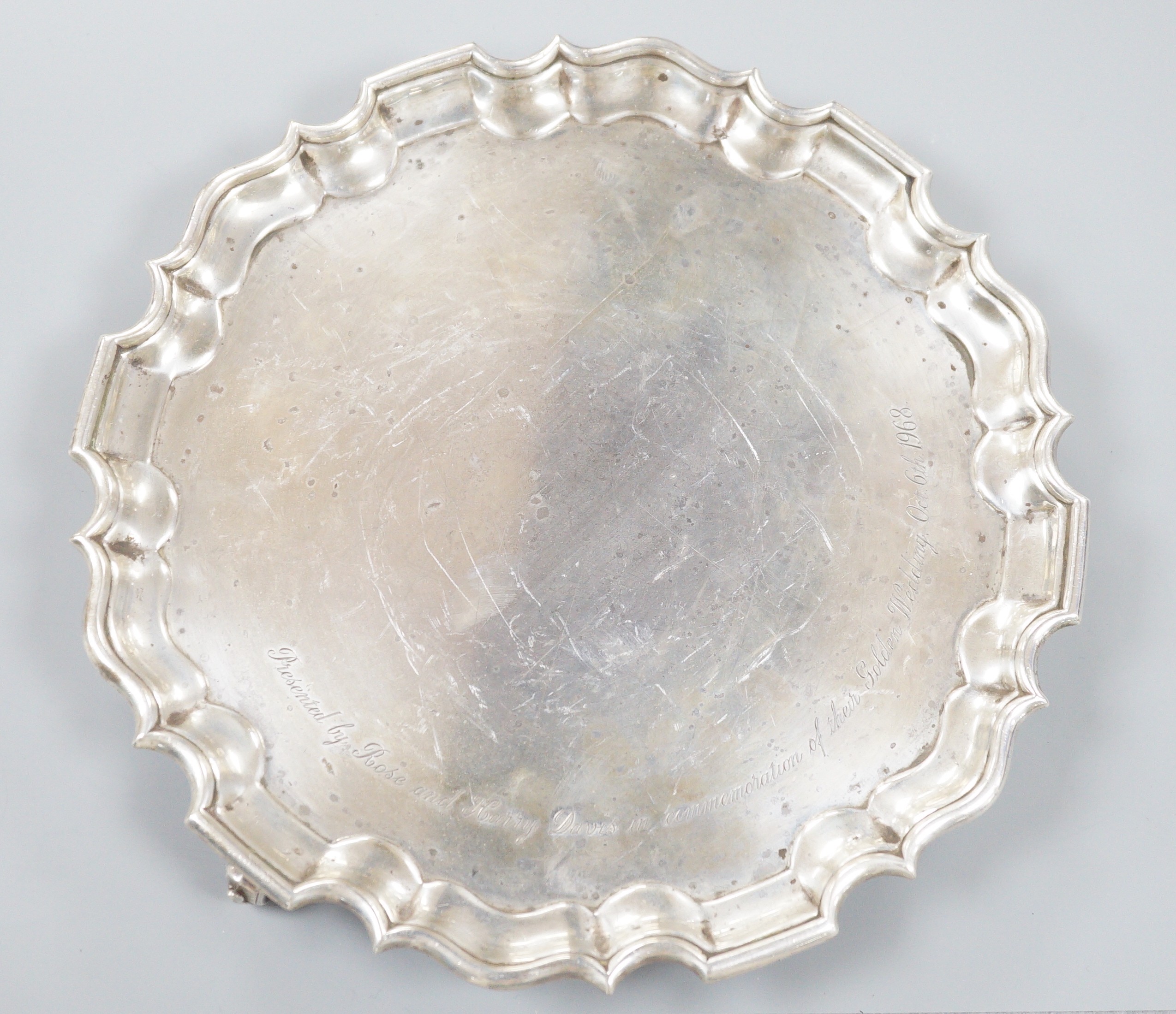 A late Victorian silver salver with later engraved inscription, Goldsmiths & Silversmiths Co Ltd, London, 1899, 25.7cm